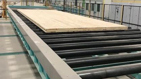 Large CLT panel on Almac's 60-foot chain driven roller conveyor system at Element 5 manufacturing facility