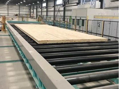 Large CLT panel on Almac's 60-foot chain driven roller conveyor system at Element 5 manufacturing facility