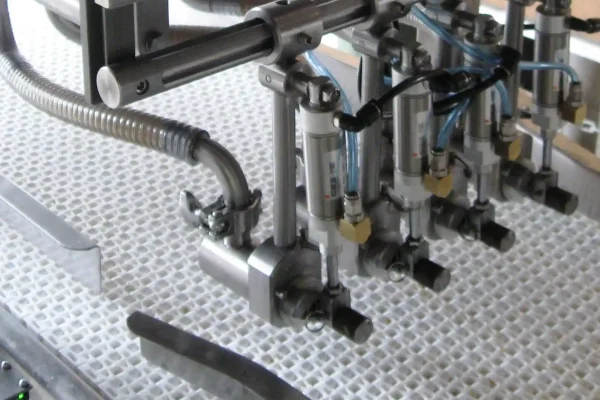 Modular belt conveyor with depositor for tart shell filling