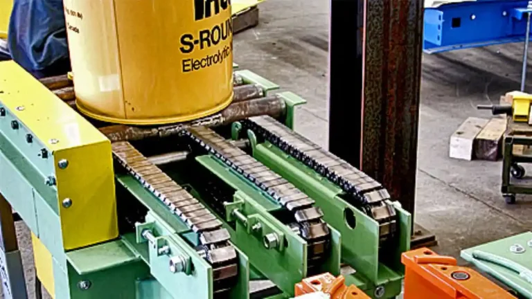 Zero-pressure accumulation conveyor system with zone-controlled sections for heavy pallet handling