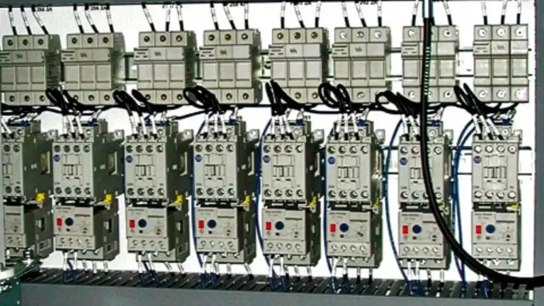 Custom conveyor control panel with PLC integration and motor control center for industrial material handling