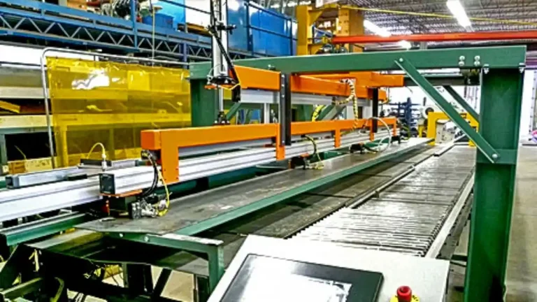 High-speed belt conveyor feeding steel sheets into roll forming line at 800 feet per minute