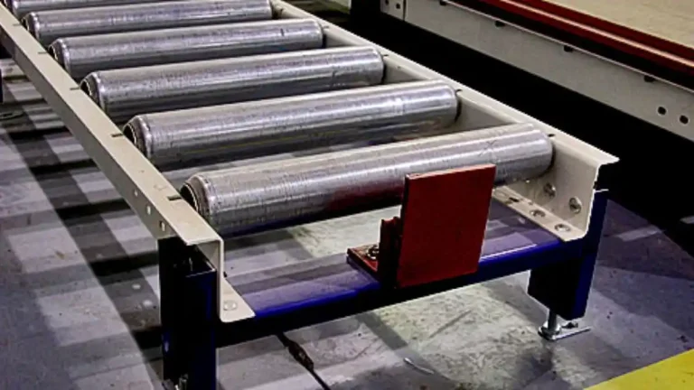 Custom roller conveyor system with powered rollers handling pallets and cartons in industrial facility